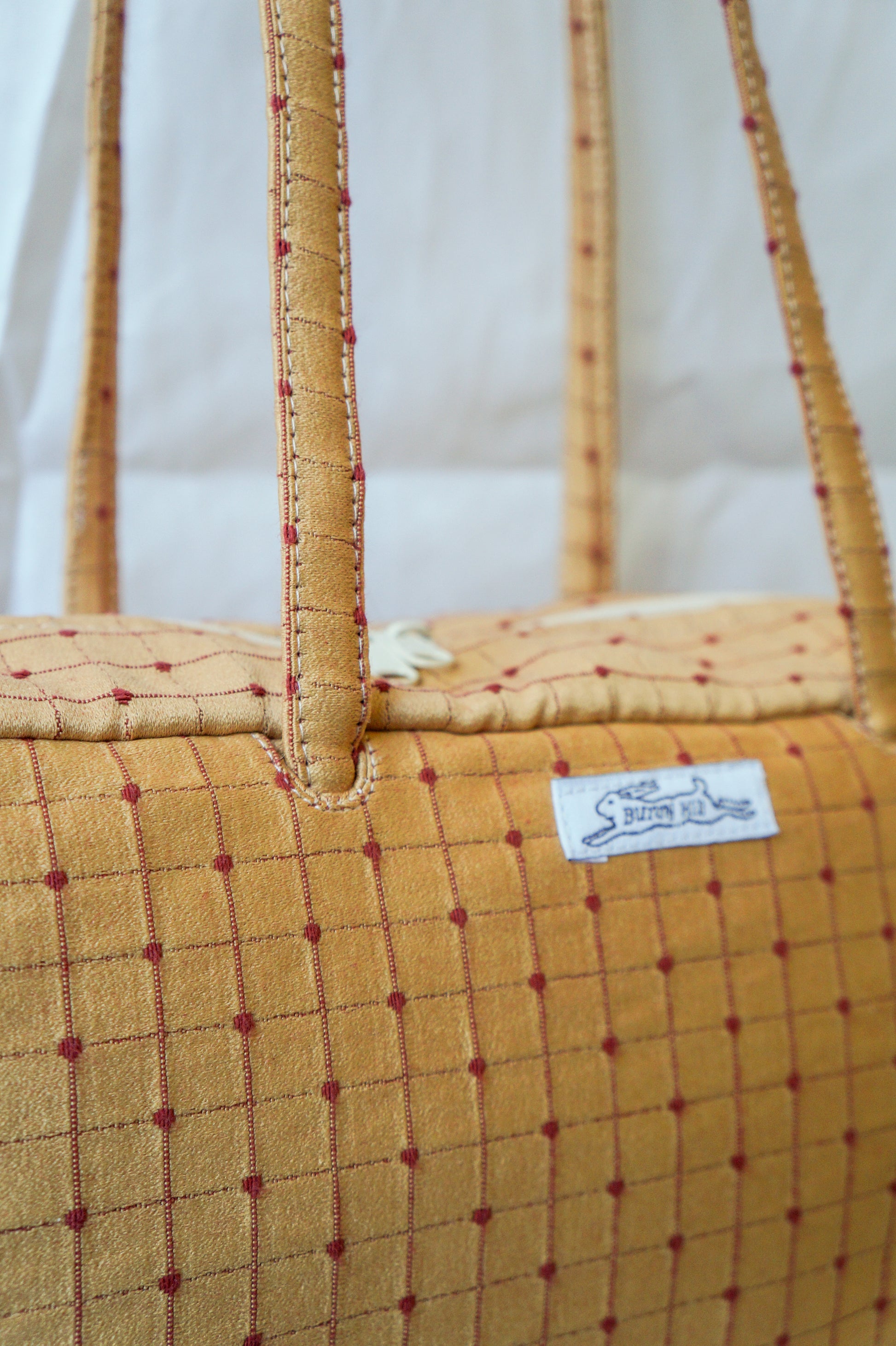 **PRE-ORDER** Handmade gold and brick red upholstery bowler bag