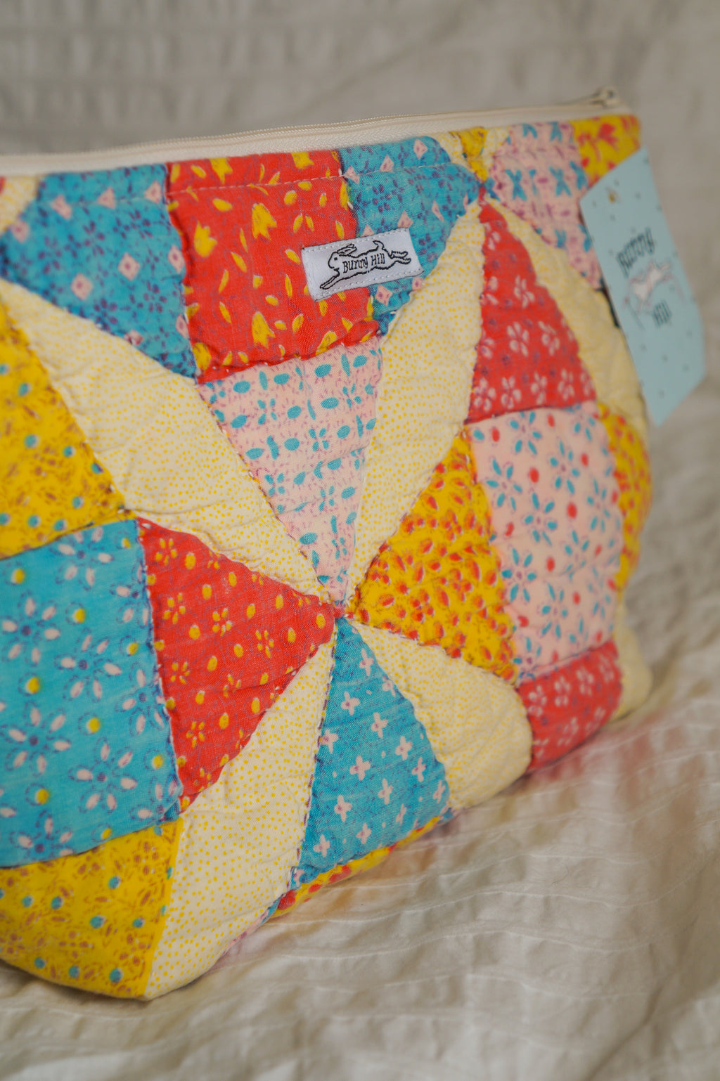 Handmade large feed sack quilt triangle pouch