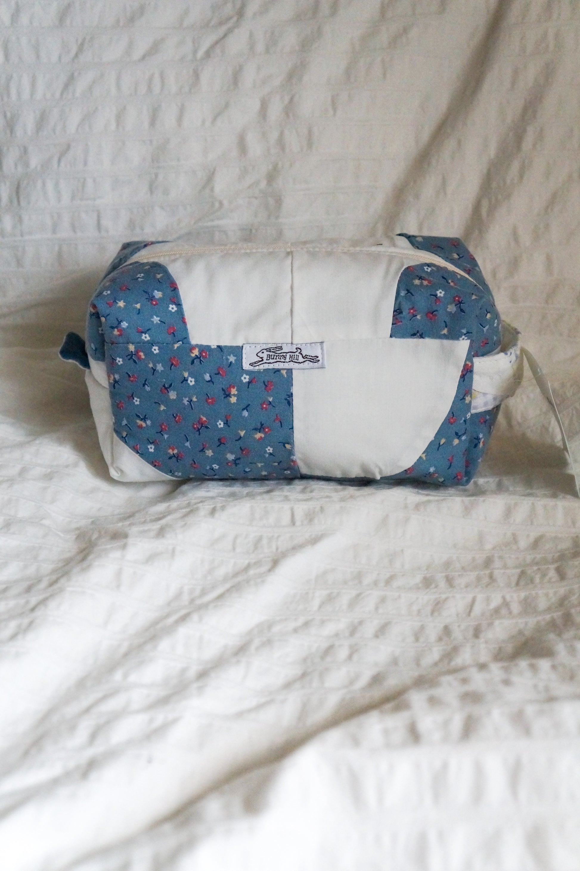 Handmade regular box pouch in blue floral quilt