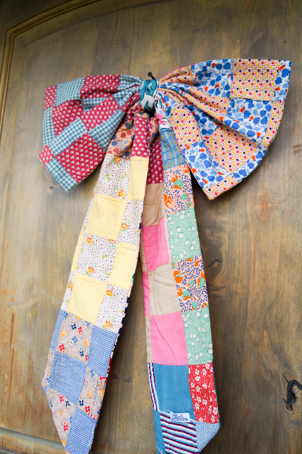 Handmade bow- vintage feed sack quilt top