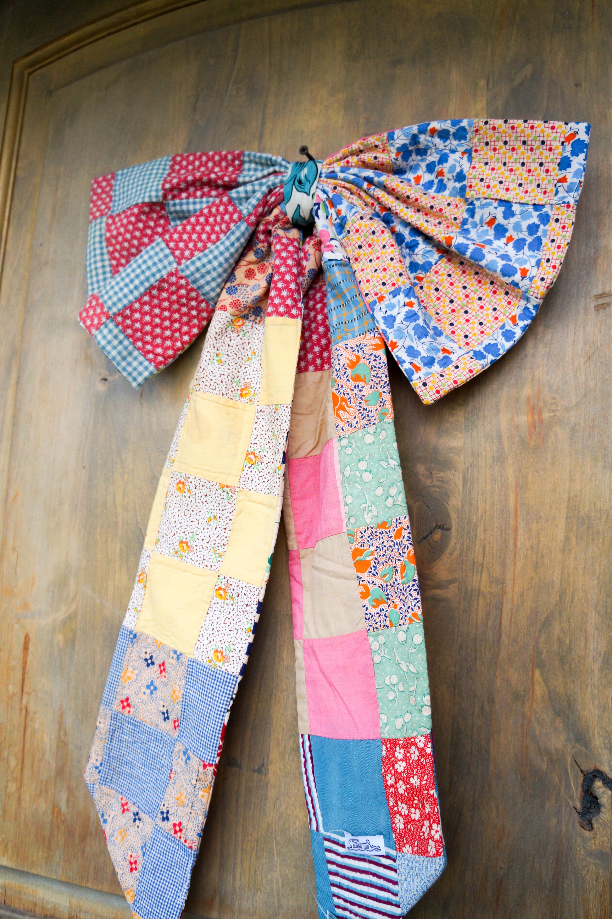 Handmade bow- vintage feed sack quilt top