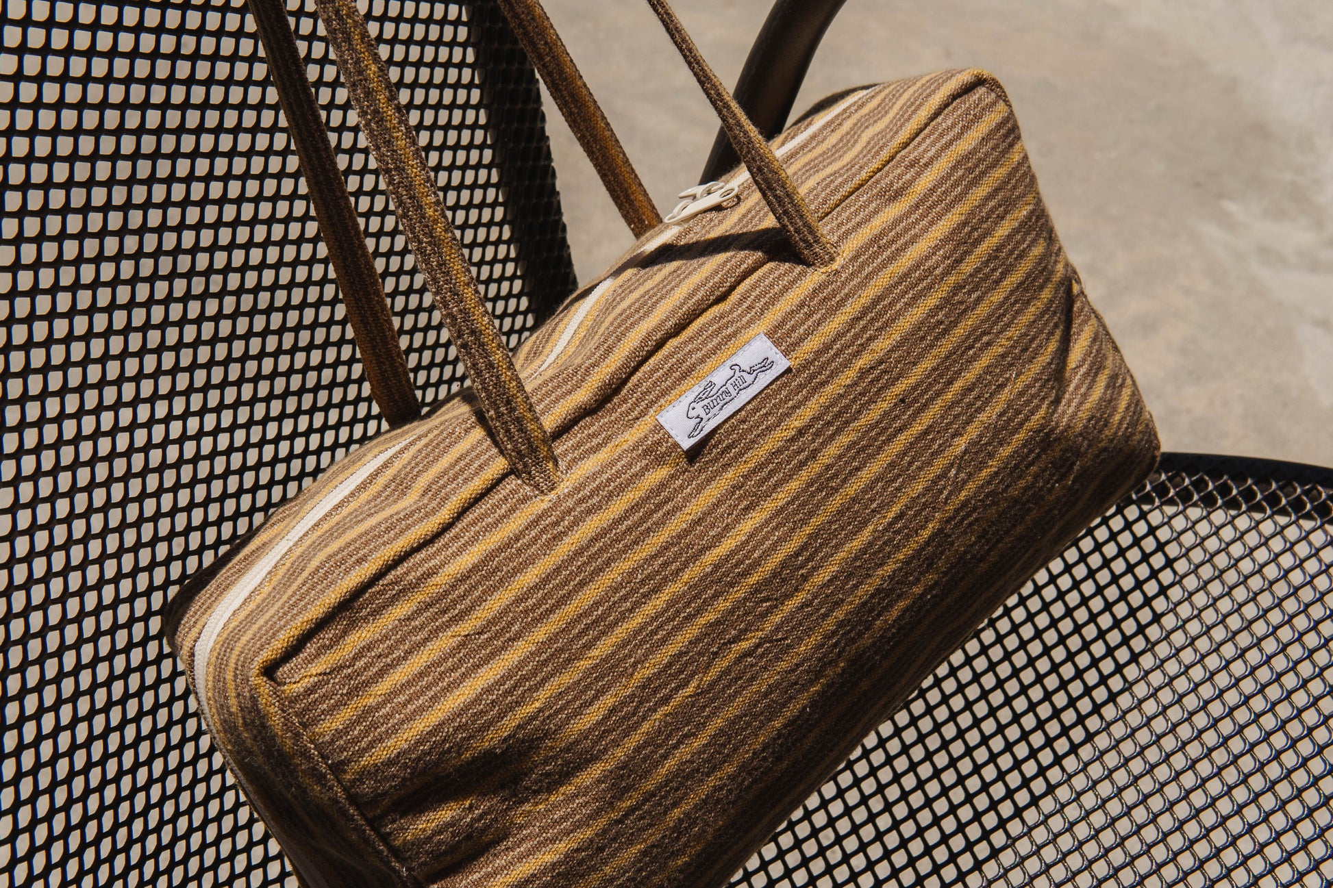 Handmade brown and yellow stripe woven tablecloth bowler bag