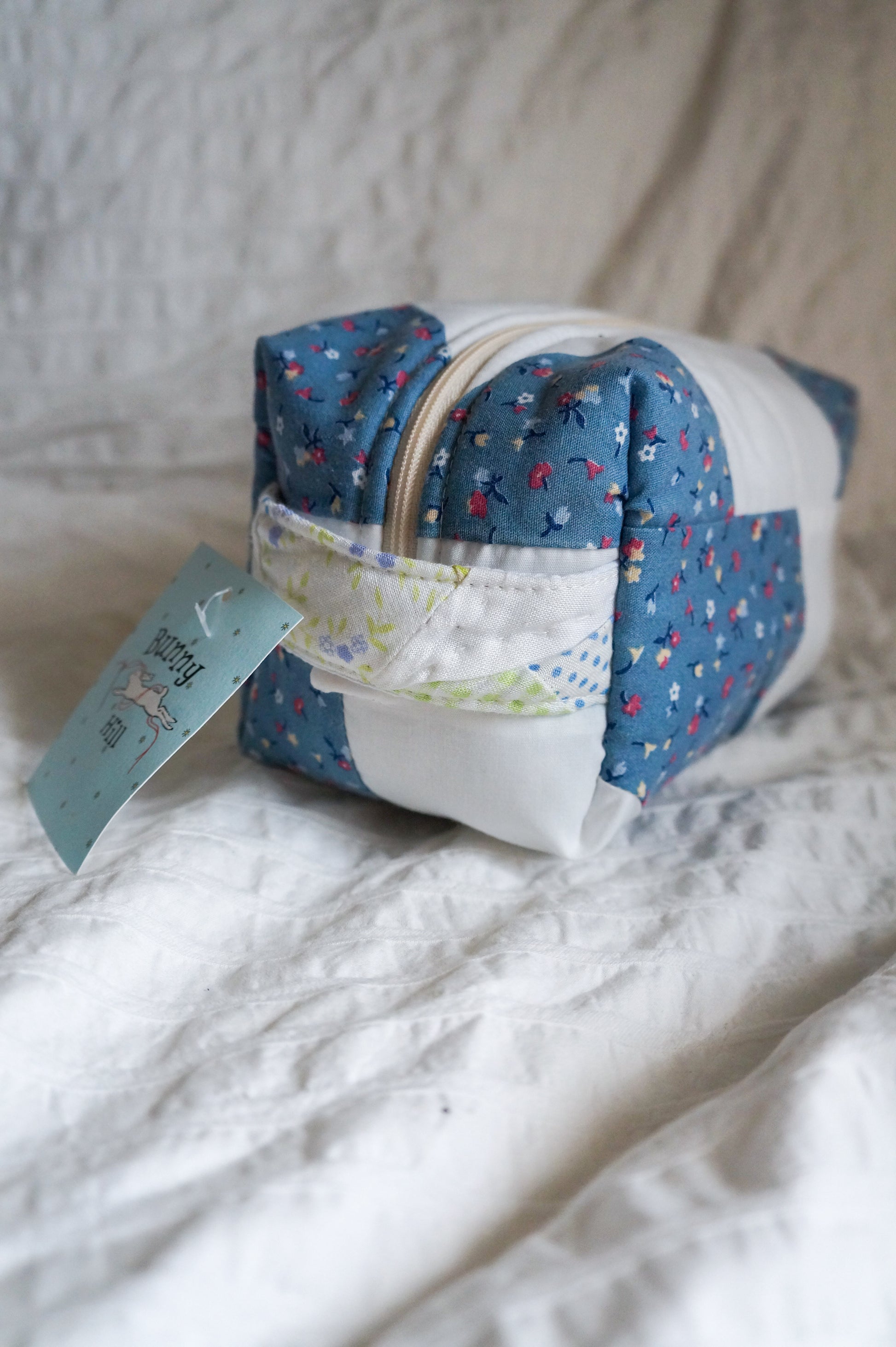 Handmade regular box pouch in blue floral quilt