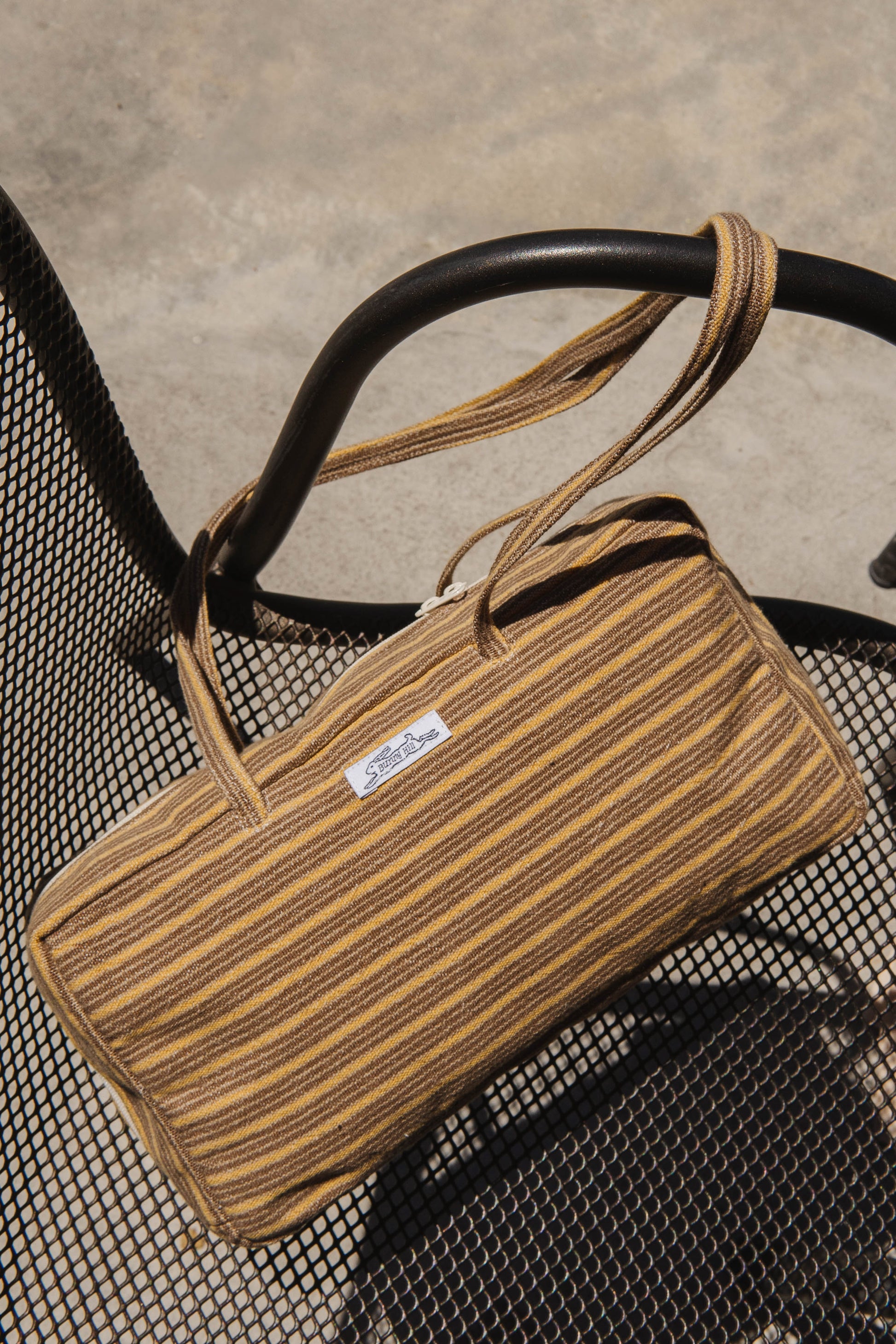 Handmade brown and yellow stripe woven tablecloth bowler bag