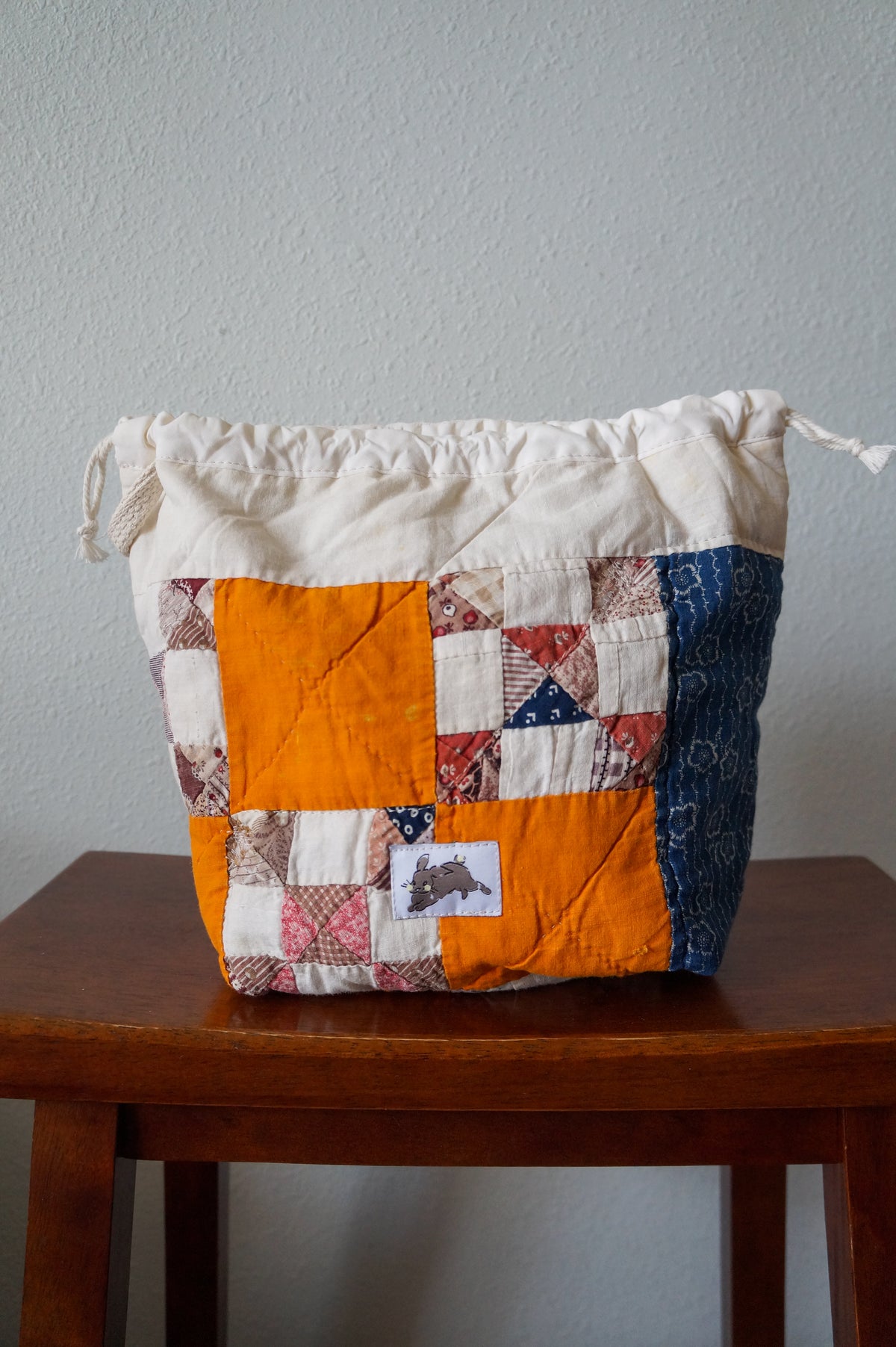 Handmade small 1/1 vintage feedsack quilt drawstring bag