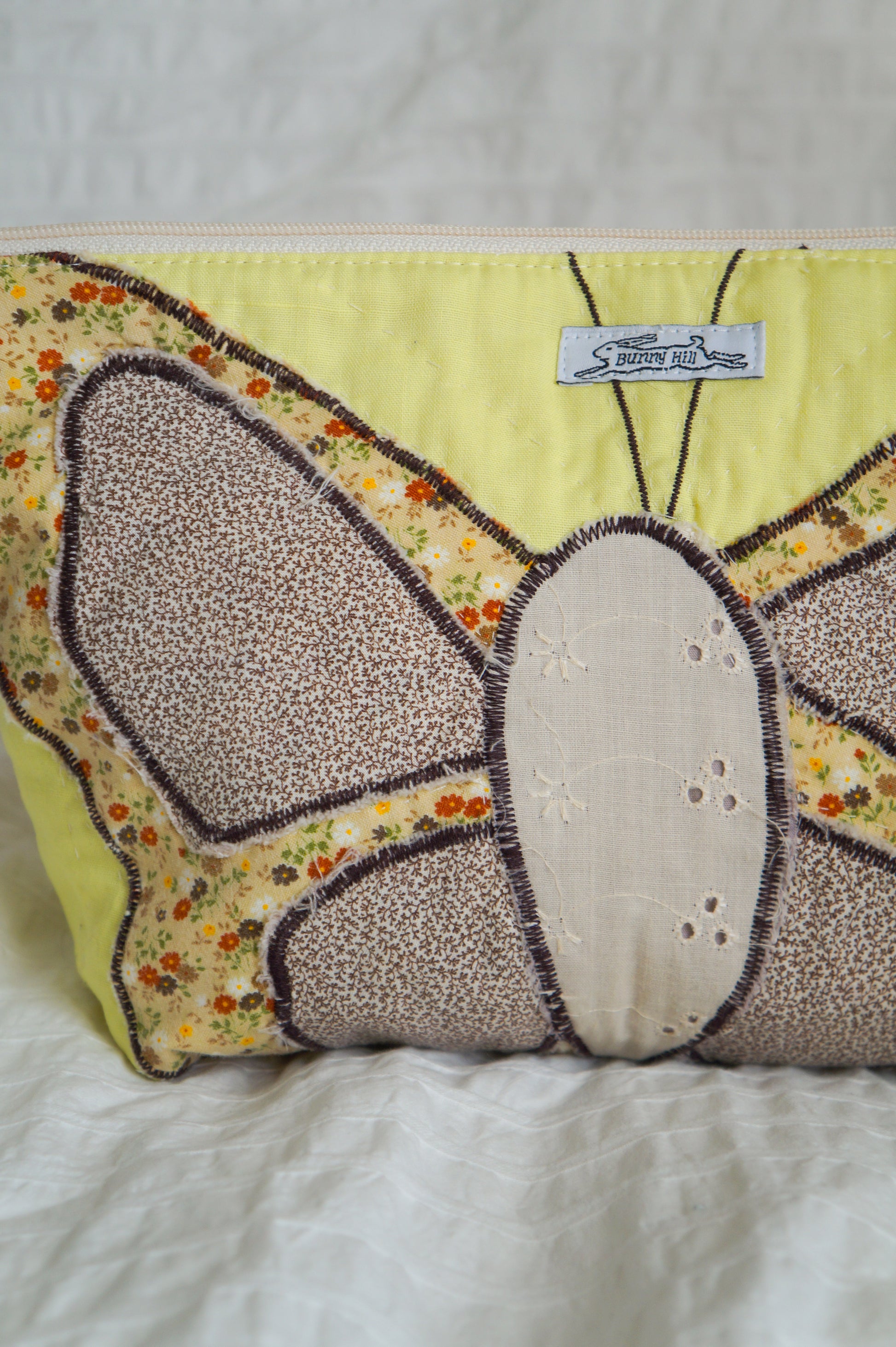Handmade large butterfly appliqué quilt corner pouch