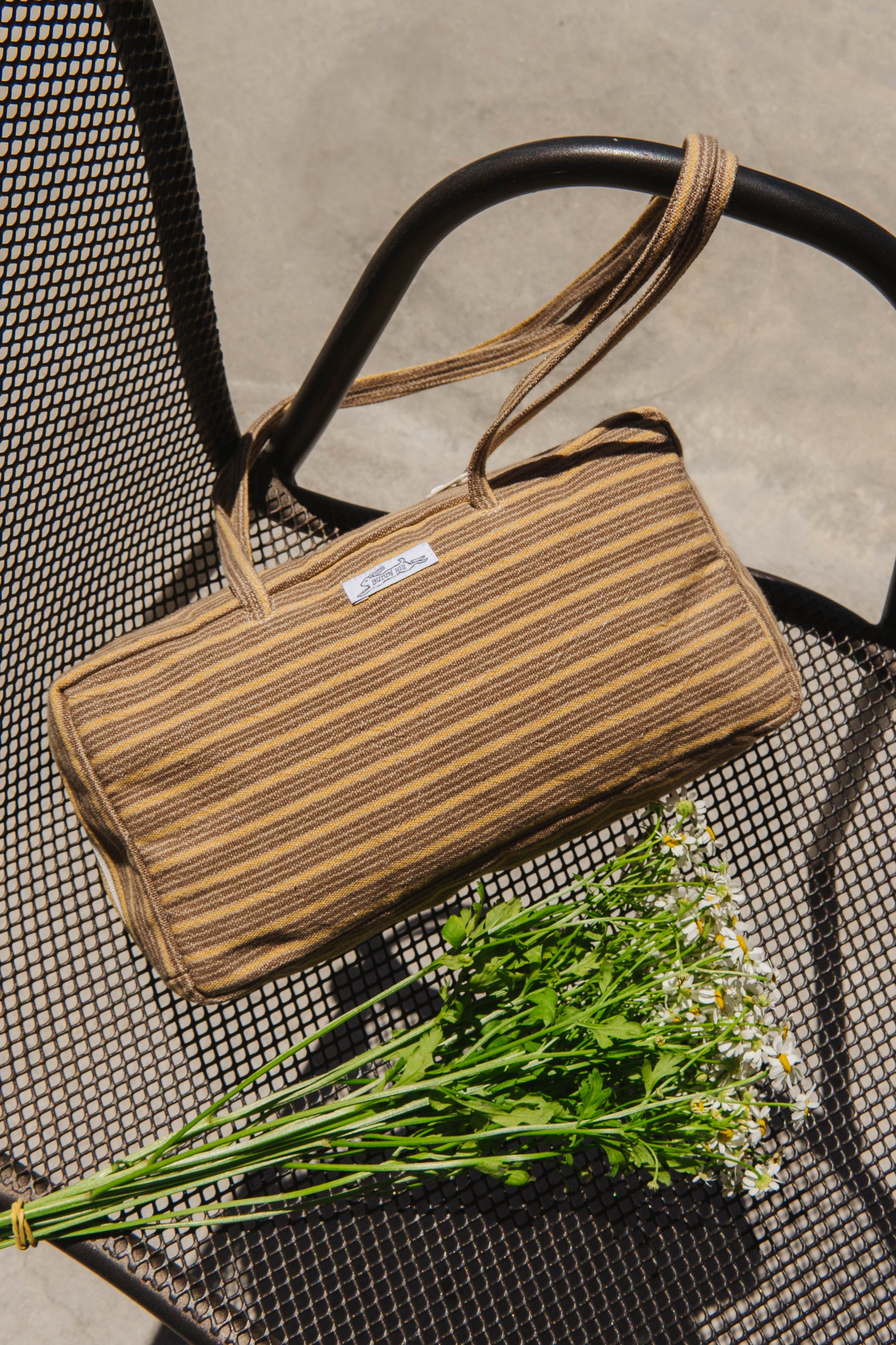 Handmade brown and yellow stripe woven tablecloth bowler bag
