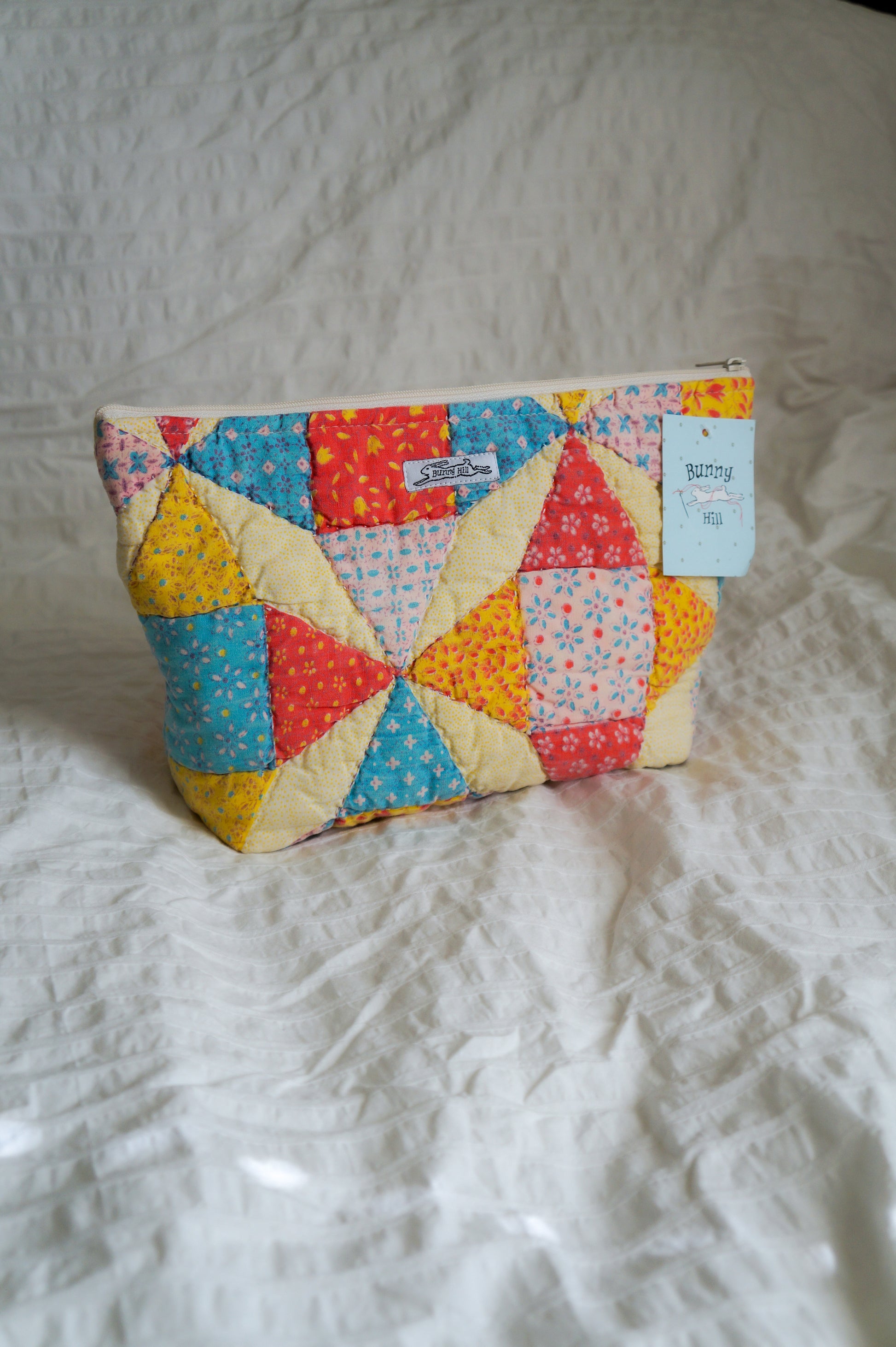 Handmade large feed sack quilt triangle pouch