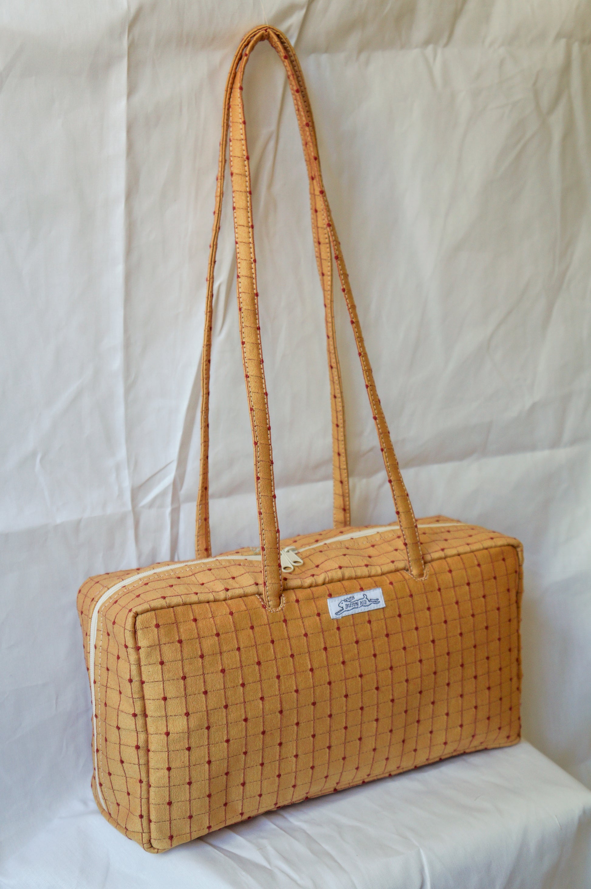 **PRE-ORDER** Handmade gold and brick red upholstery bowler bag