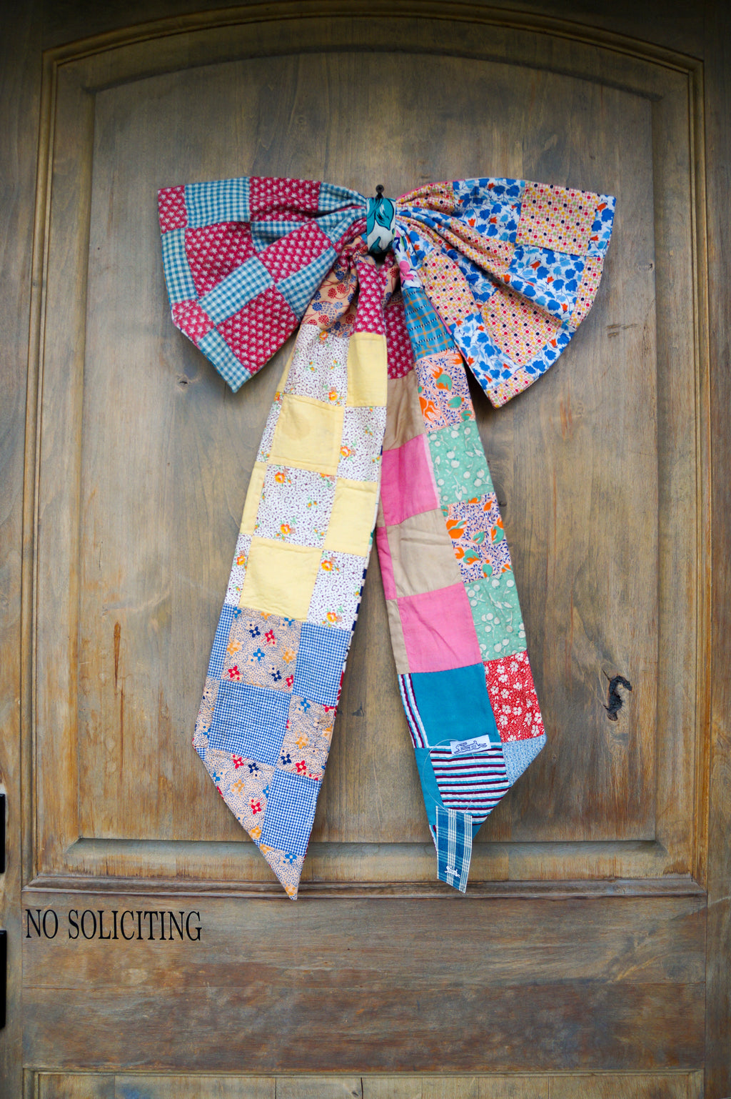 Handmade bow- vintage feed sack quilt top