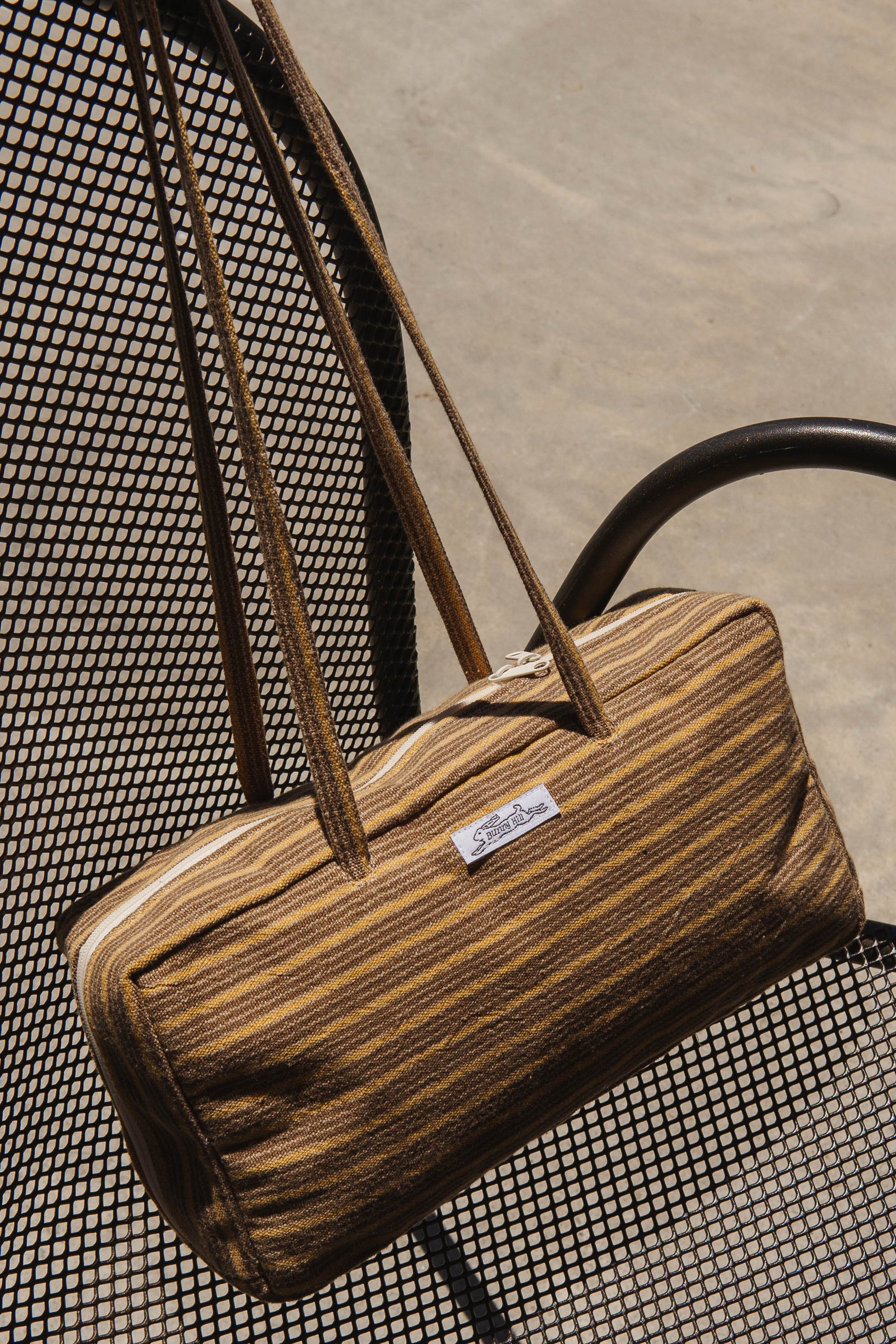 Handmade brown and yellow stripe woven tablecloth bowler bag