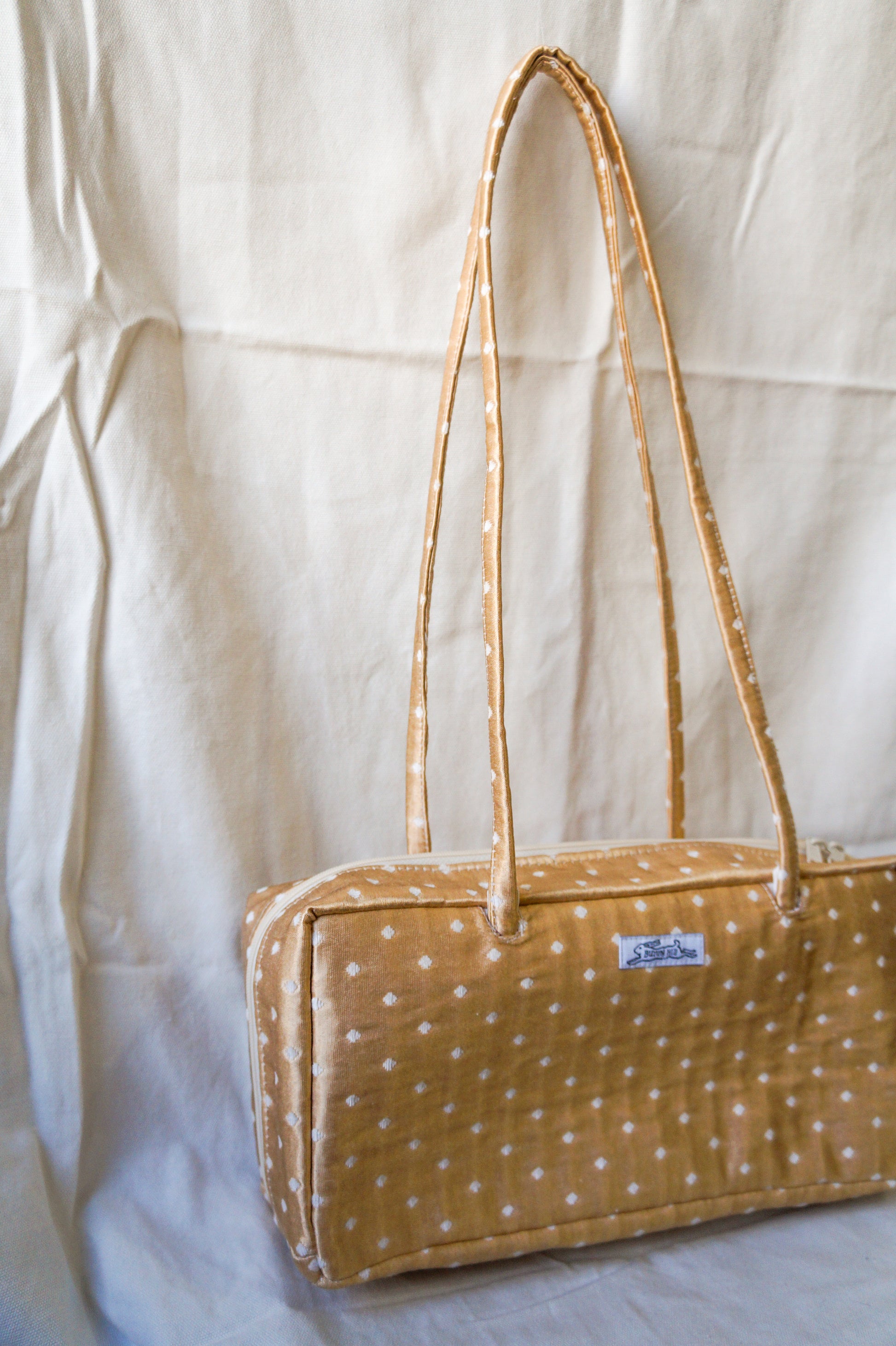 Handmade 1/1 gold polka dot upholstery bowler bag