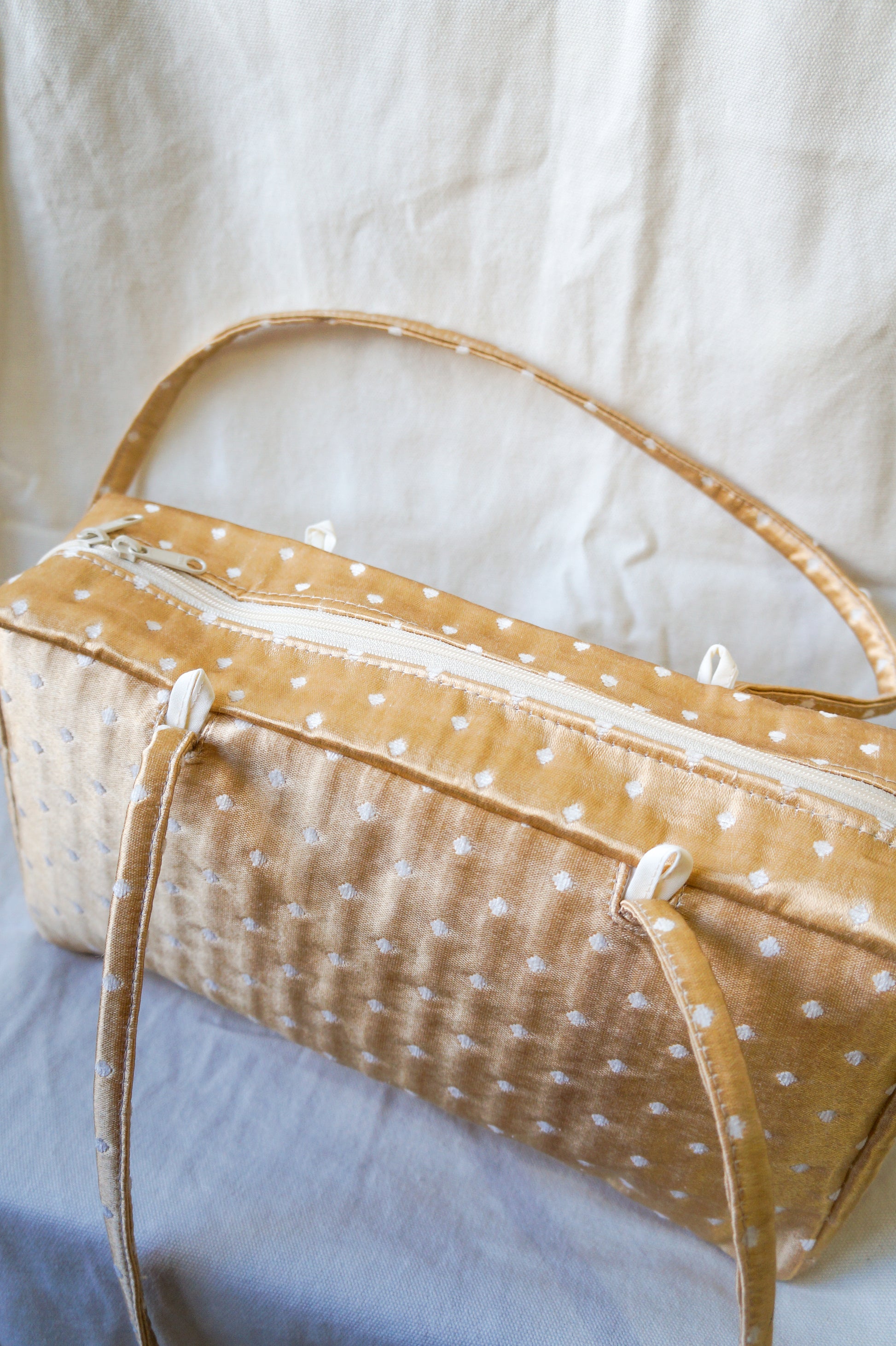 Handmade 1/1 gold polka dot upholstery bowler bag