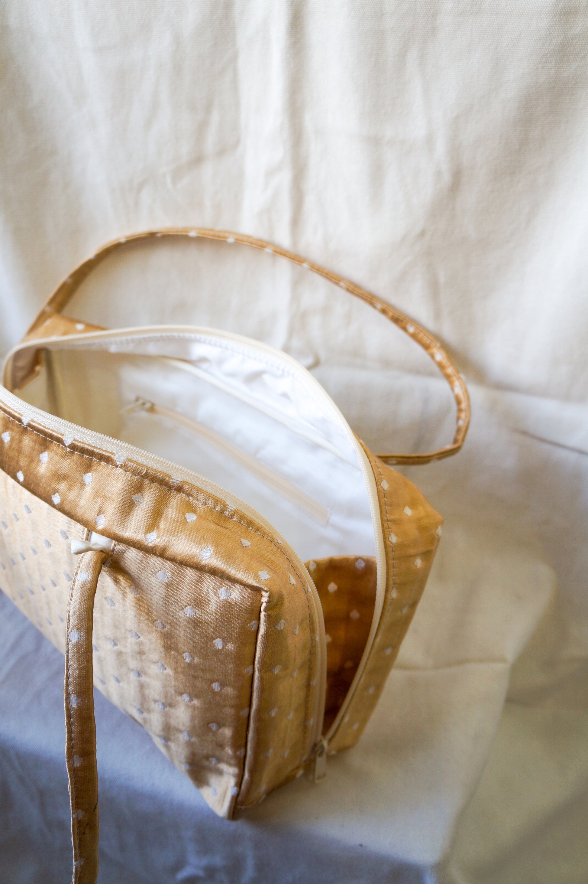 Handmade 1/1 gold polka dot upholstery bowler bag