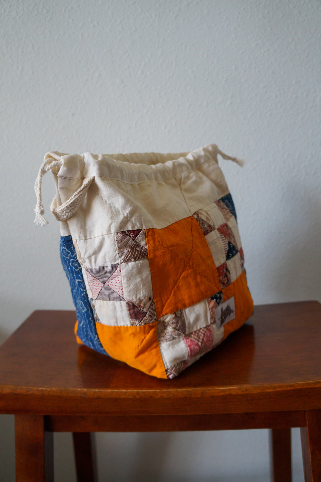 Handmade small 1/1 vintage feedsack quilt drawstring bag